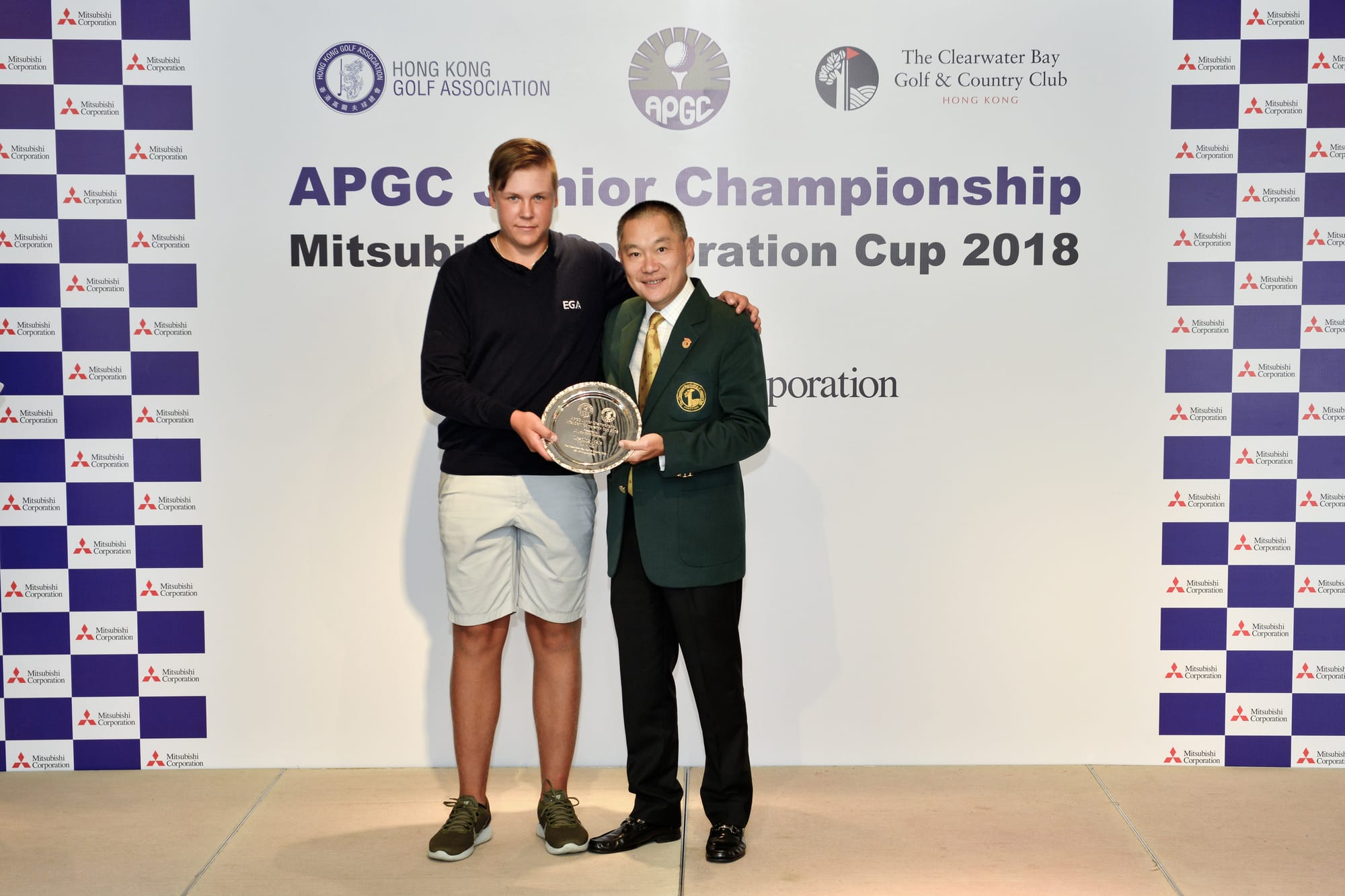 Finland's Sakke Siltala receives his award as the leading individual among the boys.