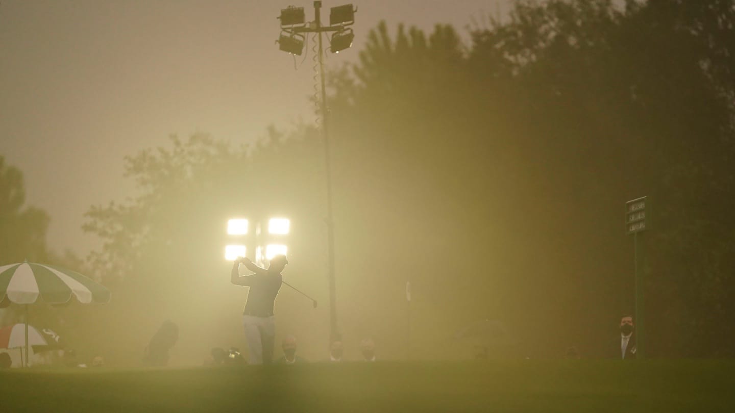 With rain falling, Lin Yuxin tees-off at hole 10 at the Masters. Picture by Logan Whitton/Augusta National.