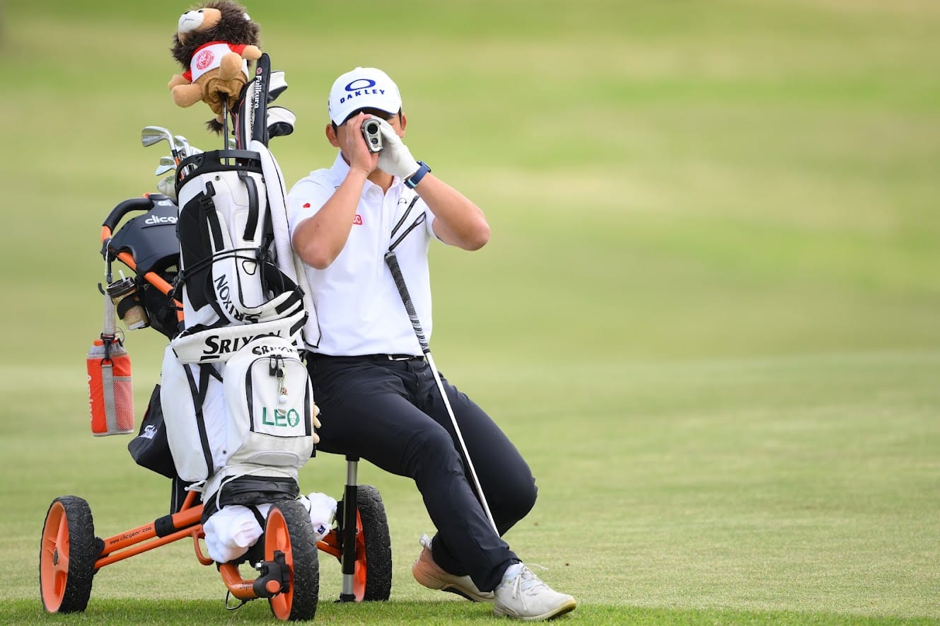 Reo Maruo checks his yardage en route to winning the boys' title at The Royal Junior.