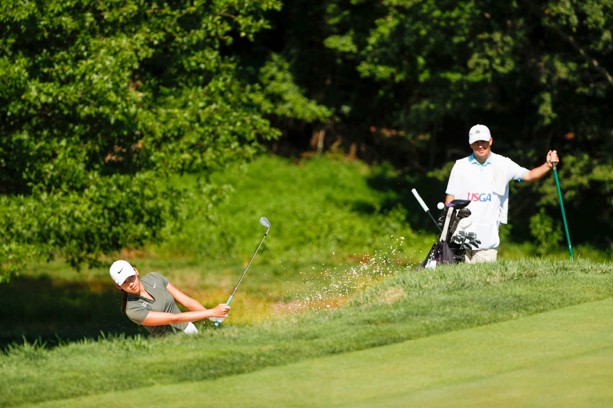 Thai Siripatsorn Patchana escapes a greenside sand trap during the stroke play phase. Picture by Chris Keane/USGA.